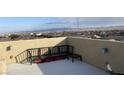 Rooftop deck with city views and seating area at 9869 Juno Hills St, Las Vegas, NV 89178