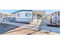 Refreshed manufactured home with carport and gated entrance at 3490 Allegheny Dr, Las Vegas, NV 89122