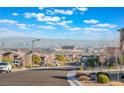 Aerial view of houses with city skyline in background at 421 Point Sur Ave, Las Vegas, NV 89138