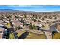 Aerial view of a residential neighborhood with a park at 5332 Iron Crossing Ave, Las Vegas, NV 89131