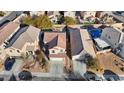 Aerial view showing a house and surrounding homes at 5332 Iron Crossing Ave, Las Vegas, NV 89131