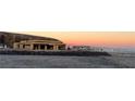 Home under construction with framing in progress, set against a scenic cityscape at sunrise at 495 Cityview Ridge Dr, Henderson, NV 89012
