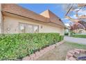 House exterior showcasing a well maintained lawn and shrubs at 3719 Colonial Dr, Las Vegas, NV 89121