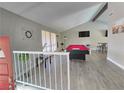 Game room with pool table, high ceiling, and hardwood floors at 5882 W Viking Rd, Las Vegas, NV 89103