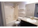 Clean bathroom featuring a shower/tub combo and granite vanity at 7563 Durham Hall Ave # 101, Las Vegas, NV 89130