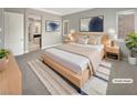 Serene main bedroom with neutral tones, natural light, and access to the ensuite bath at 3408 Isle Dr, Las Vegas, NV 89141