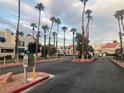 Gated community entrance with palm trees at 4140 Gannet Cir # 251, Las Vegas, NV 89103