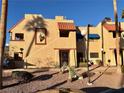 Spanish style building exterior with landscaping at 4140 Gannet Cir # 251, Las Vegas, NV 89103