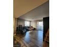 Spacious living room features hardwood floors and a large sofa at 2725 S Nellis Blvd # 1105, Las Vegas, NV 89121