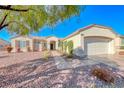 House exterior showcasing a walkway leading to the front door at 2313 Fox Hills Dr, Henderson, NV 89052