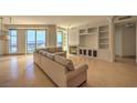Spacious living room with a fireplace and city views at 9101 Alta Dr # 1204, Las Vegas, NV 89145