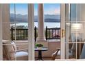 Private balcony offers breathtaking lake and mountain views at 20 Via Visione # 104, Henderson, NV 89011