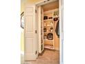 Open pantry showcases shelving holding various food items and appliances, adding convenience at 200 W Sahara Ave # 601, Las Vegas, NV 89102