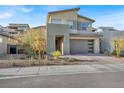 Two-story home with attached garage and landscaping at 437 Cascade Heights Ave, Las Vegas, NV 89138