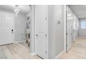 Light and airy entryway with hardwood floors and white doors at 2391 Dalewood Ave, North Las Vegas, NV 89086