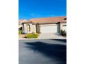 Charming single-story home with desert landscaping, featuring a two car garage and lovely curb appeal at 5048 Orchid Springs St, Las Vegas, NV 89148
