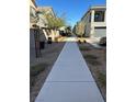 Landscaped community pathway with homes on either side at 7368 N Decatur Blvd # 1, Las Vegas, NV 89131