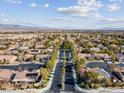 Aerial view of suburban neighborhood with tree-lined streets at 8229 Flowing Rapids Ct, Las Vegas, NV 89131