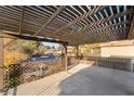 Covered patio with pergola and views of the community at 1865 Apricot Ct, Henderson, NV 89014