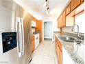 Bright kitchen featuring stainless steel appliances and granite countertops at 2831 Geary Pl # 2921, Las Vegas, NV 89109