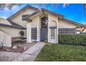 House exterior featuring a blue door and a stone pathway at 4705 Rockvale Dr, Las Vegas, NV 89103