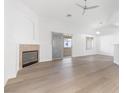 Bright living room with fireplace and sliding glass doors at 5125 Coral Beach St, North Las Vegas, NV 89031