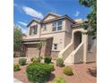 Attractive two-story home featuring desert landscaping, a two-car garage, and a welcoming front entrance at 7914 Torreys Peak St, Las Vegas, NV 89166