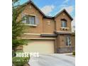 Two-story house with beige exterior, attached garage, and landscaping at 3641 Via Terracina, Henderson, NV 89052
