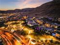 Night view of houses in a residential community at 10325 Jade Point Dr, Las Vegas, NV 89135