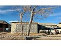 House exterior with decorative block wall and driveway at 1924 Hart Ave, North Las Vegas, NV 89032