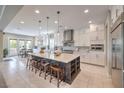 Spacious kitchen with island and stainless steel appliances at 3267 Royal Fortune Dr, Las Vegas, NV 89141