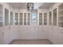 Large walk-in closet with ample shelving and drawers at 3267 Royal Fortune Dr, Las Vegas, NV 89141