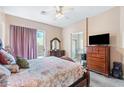 Spacious bedroom with a comfortable bed and plenty of closet space at 7348 Zion Falls St, Las Vegas, NV 89131