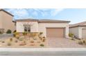 Single-story home with attached garage and landscaped front yard at 10262 Super Jovian St, Las Vegas, NV 89143