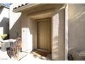 Tan colored home exterior with a private entrance at 1350 Crystal Hill Ln # 3, Henderson, NV 89012