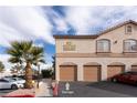 Condominium with attached garages, and a well-maintained exterior at 1830 N Buffalo Dr # 2095, Las Vegas, NV 89128