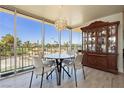 Dining area with city views and a wooden hutch at 3111 Bel Air Dr # 4G, Las Vegas, NV 89109