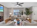 Bright and airy living room with a cozy seating area and large window at 7134 Grasswood Dr, Las Vegas, NV 89147