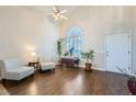 Bright living room with hardwood floors and vaulted ceilings at 2525 Huber Heights Dr, Las Vegas, NV 89128