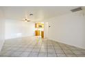 Bright living room with tile floors and a ceiling fan at 3017 Saint George St # B, North Las Vegas, NV 89030