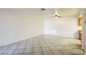 Open living room with tile flooring and neutral walls at 3017 Saint George St # B, North Las Vegas, NV 89030