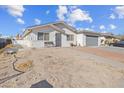 House exterior with driveway and front yard at 4027 Boratko St, Las Vegas, NV 89115