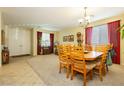 Bright dining room featuring a wooden table and chairs at 7317 Wild Roar Ave, Las Vegas, NV 89129