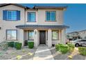 Townhome's entrance with landscaping and walkway at 7336 N Decatur Blvd # 2, Las Vegas, NV 89131