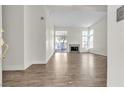 Bright living room with hardwood floors and fireplace at 7608 Sea Wind Dr, Las Vegas, NV 89128