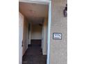 Entryway into condo, showing tile flooring and access to living areas at 833 Aspen Peak Loop # 2225, Henderson, NV 89011