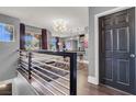 Upper hallway with dark wood floors and modern door at 9000 Las Vegas Blvd # 2222, Las Vegas, NV 89123