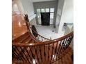 Two-story living room with fireplace and marble floors at 9703 Newport Coast Cir, Las Vegas, NV 89147