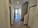 Bright entryway with tile flooring and access to backyard at 1113 Dawn Valley Dr, North Las Vegas, NV 89031