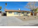 Charming single story home with a well-maintained lawn at 1212 Reynolds Ave, North Las Vegas, NV 89030